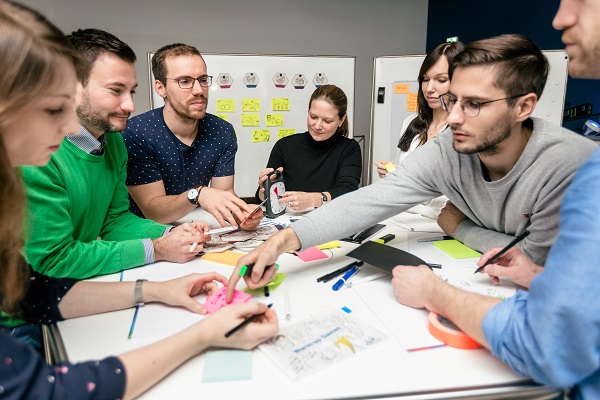 Group of people discussing on the design